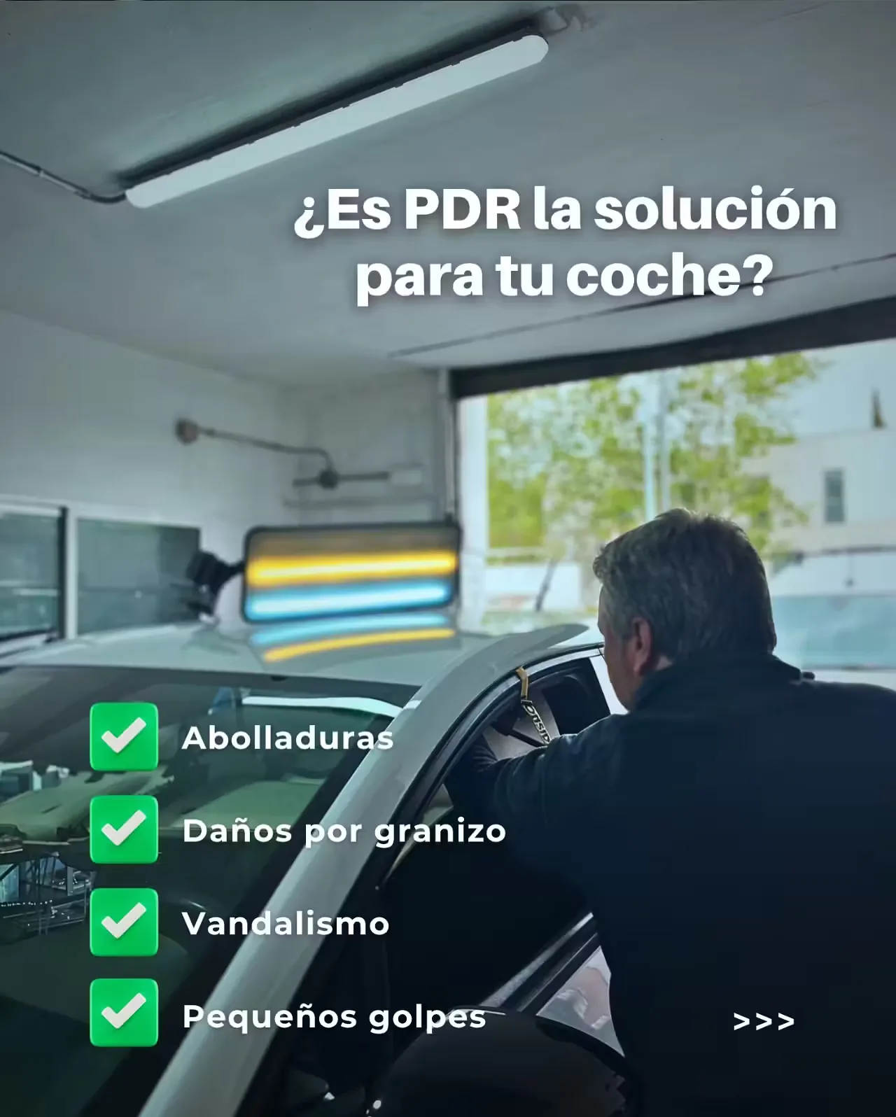 Después: reparación PDR en lateral de vehículo blanco